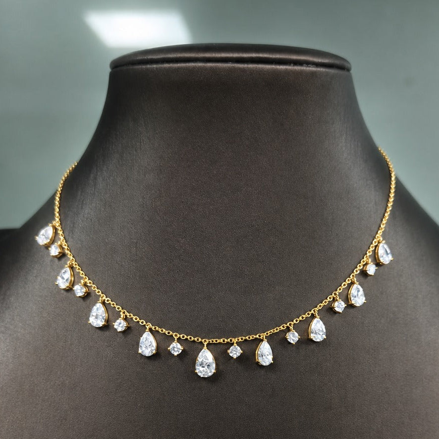 pear cut lab grown diamond dainty necklace set in 18k yellow gold 