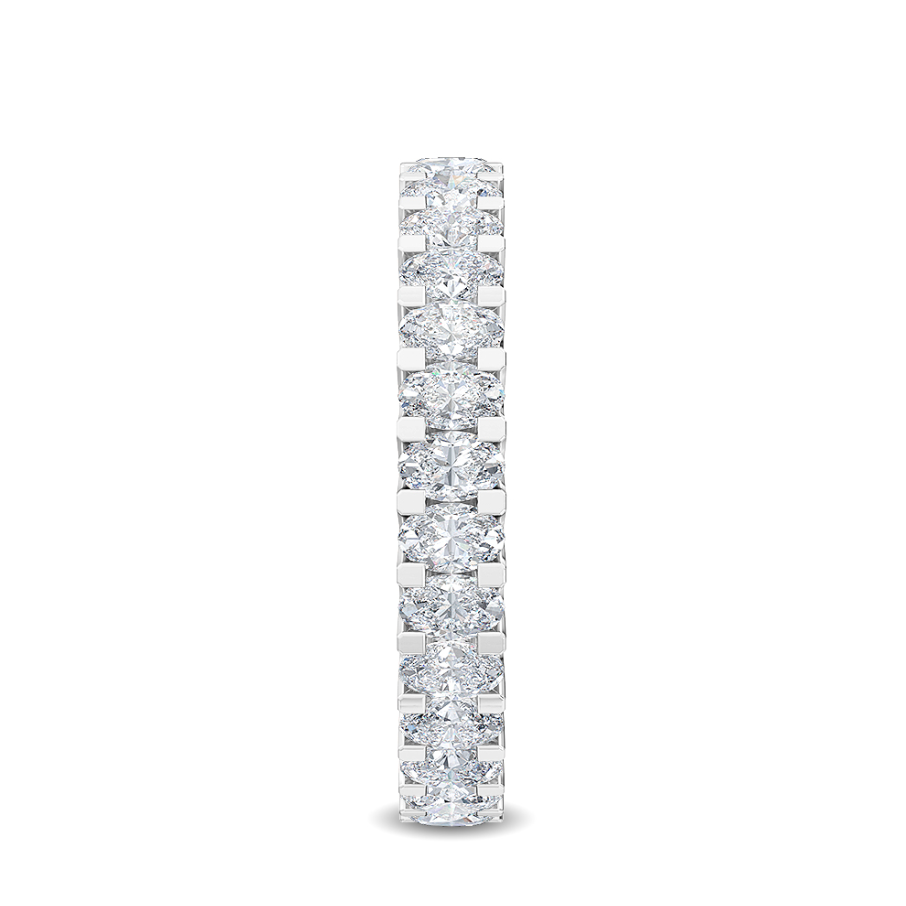 Side view of oval brilliant lab-grown diamonds set in a polished wedding band

